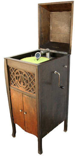 Looks like this, but the metal plate is rusted out and we have no winding tool for it