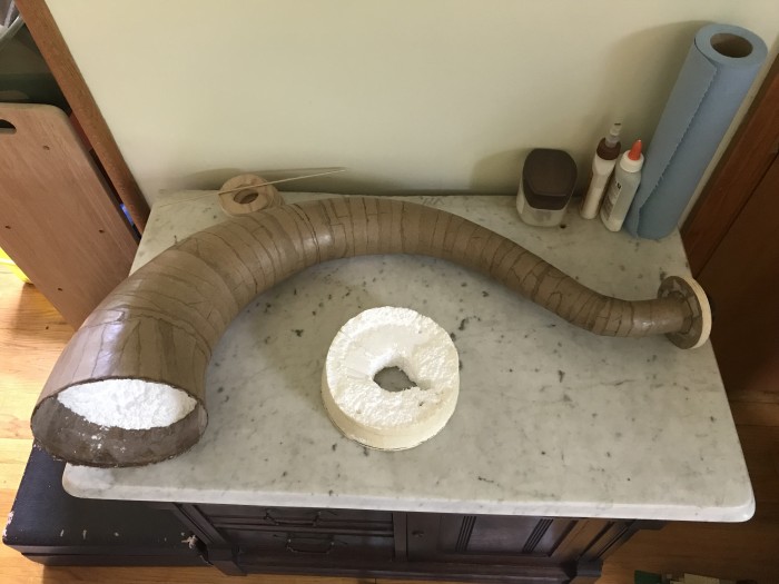 The horn  with part of the former removed and part still inside.