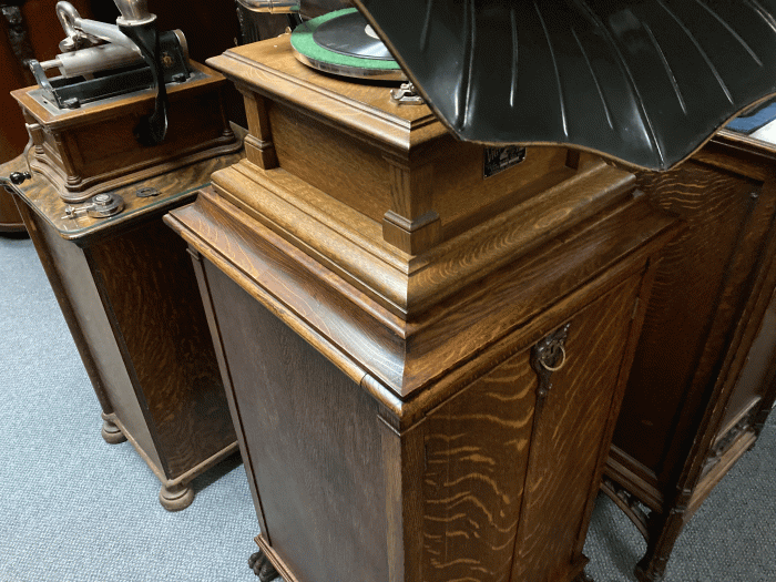 This photo shows how the Victor V is displayed in my collection.  You can see the slight difference in color between the machine and cabinet.