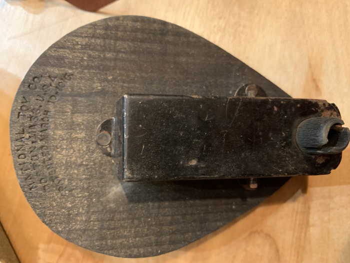 The National Toy co. stamped under the base